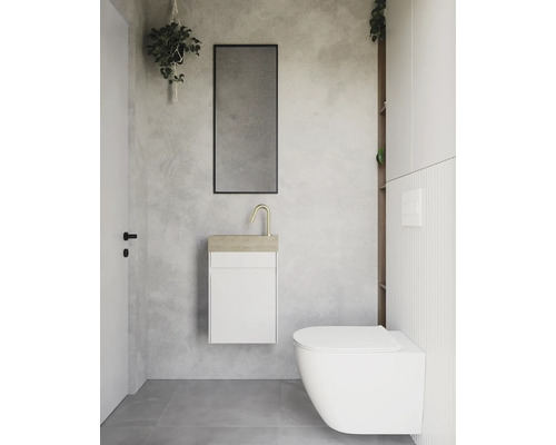 Modernes Badezimmer mit Hänge-WC, Waschtisch, Spiegel und Pflanzen