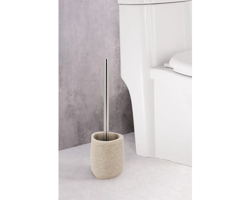 Toilettenbürste mit Behälter und Edelstahlgriff neben einer Toilette