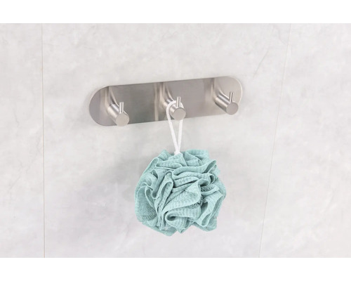 Patère murale métallique avec éponge de bain