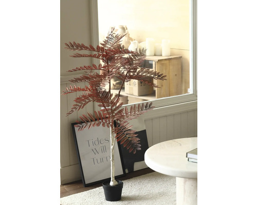 Dekorativer Kunstbaum mit Blättern im Topf zur Innendekoration