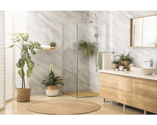 Modernes Badezimmer mit Dusche, Waschtisch, Spiegel und Pflanzen für eine freundliche Atmosphäre.