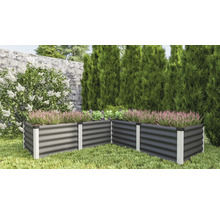 Hochbeet aus Metall im Garten mit Pflanzen