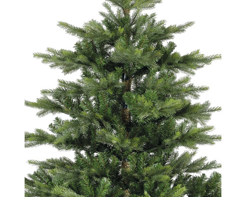 Gros plan d'un arbre de Noël artificiel avec des aiguilles vertes