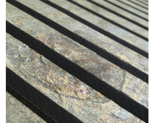 Gros plan de panneaux en pierre naturelle avec accents sombres pour la décoration murale