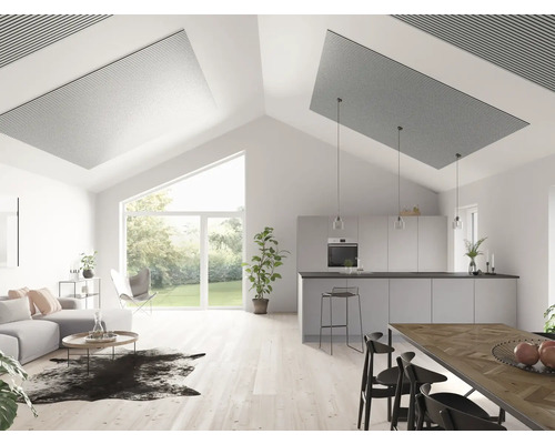 Espace de vie lumineux avec panneaux acoustiques au plafond, combiné avec cuisine et coin repas.