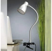 Lampe à pince avec bras flexible sur une table à côté d''un ordinateur portable.