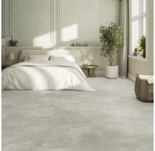 Chambre à coucher avec lit double et carrelage