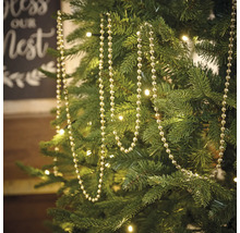 Weihnachtsbaum geschmückt mit einer silberfarbenen Kugelkette