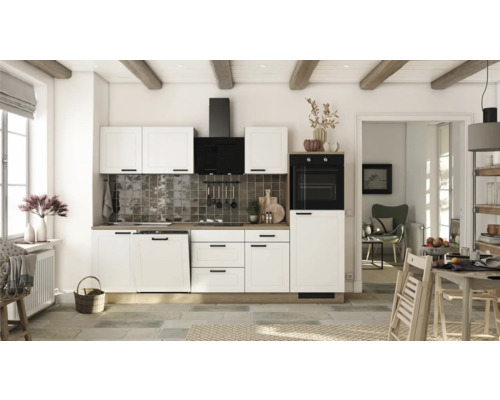 Ensemble de cuisine avec appareils Julia 280 cm blanc mat démonté Variante réversible 00012877 Cuisine claire avec armoires blanches, hotte aspirante et four intégré dans une pièce claire et spacieuse.