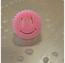 Éponge à vaisselle rose avec visage