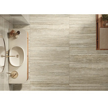 Carrelage beige dans une salle de bain avec lavabo et miroir