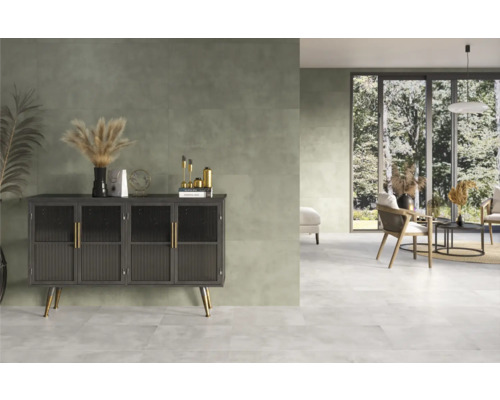 Espace de vie avec carrelage, commode et sièges