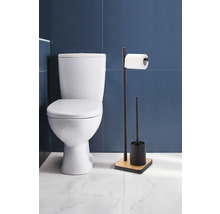 Salle de bains avec toilettes et support de papier toilette avec brosse
