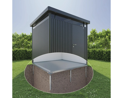 Abri de jardin métallique avec plaque de base et fondation à vis dans le jardin