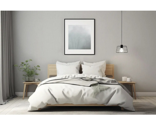 Chambre à coucher avec lit, tables de chevet, lampe et décoration pour une ambiance cosy