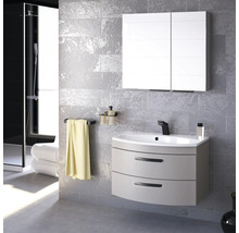 Modernes Badezimmer mit Waschtisch, Spiegelschrank und Handtuchhalter vor grauer Wand
