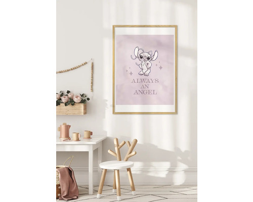 Photo encadrée d'une chambre d'enfant avec l'inscription Always an Angel.