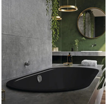 Salle de bains moderne avec baignoire noire, lavabo et miroir