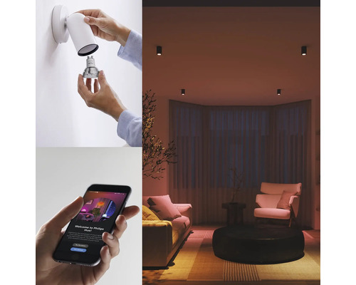 Mise en scène : une personne change une ampoule dans un applique murale, smartphone avec commande d’application, salon avec plafonniers.