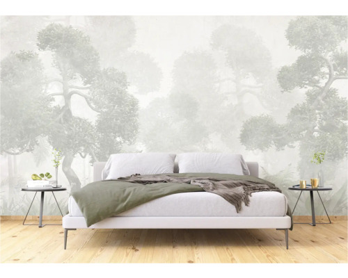Chambre avec papier peint photo motif forêt derrière un lit