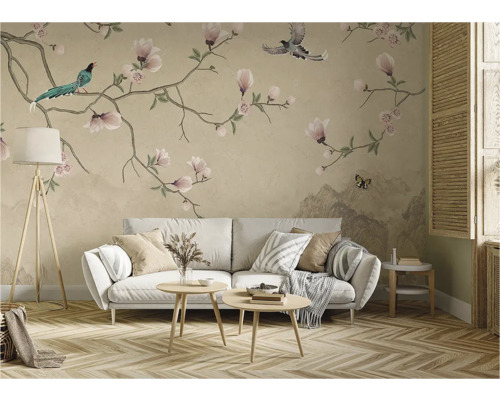 Salon avec papier peint floral, canapé et parquet
