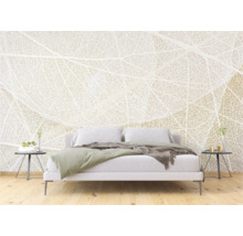 Chambre à coucher avec literie blanche et papier peint photo motif feuille