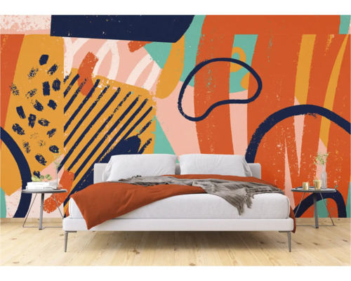 Chambre avec papier peint à motifs abstraits et lit