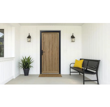 Espace d'entrée avec porte d'entrée, banc et bac à plantes