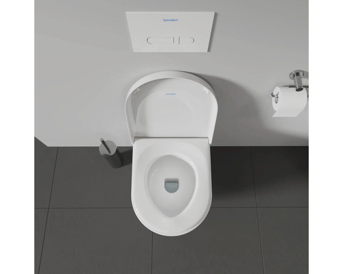 Vue de dessus de toilettes avec réservoir et porte-papier toilette