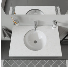 Plan de toilette de salle de bains avec vasque ronde et robinet