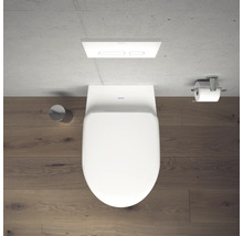 Vue de dessus de toilettes avec réservoir de chasse d'eau et porte-papier toilette