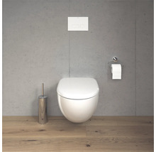 Salle de bains moderne avec WC suspendu, porte-papier toilette et brosse de toilette