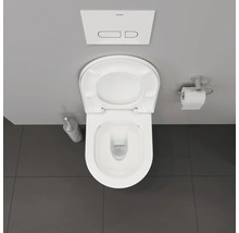Vue de dessus de toilettes avec couvercle ouvert, brosse de toilettes, porte-papier toilette et logo Duravit