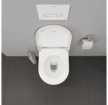 Vue de dessus de toilettes avec réservoir, porte-papier toilette et brosse de toilette