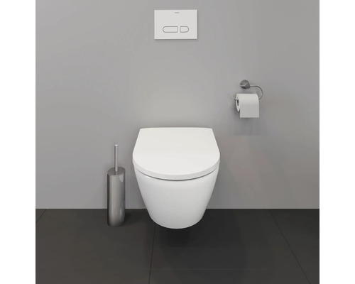 WC suspendu avec plaque de commande, brosse de toilette et porte-papier toilette