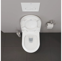 Vue de dessus de toilettes avec couvercle ouvert, brosse de toilette, porte-papier toilette et logo Duravit.