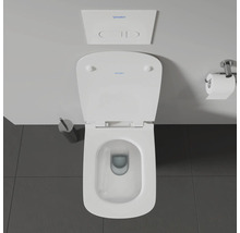 Vue de dessus de toilettes avec réservoir de chasse et porte-papier toilette