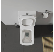 Vue de dessus de toilettes avec couvercle ouvert dans une salle de bains