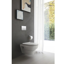 WC suspendu dans une salle de bain lumineuse avec œuvres d'art.