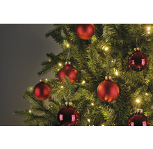 Arbre de Noël décoré avec des boules rouges et des lumières