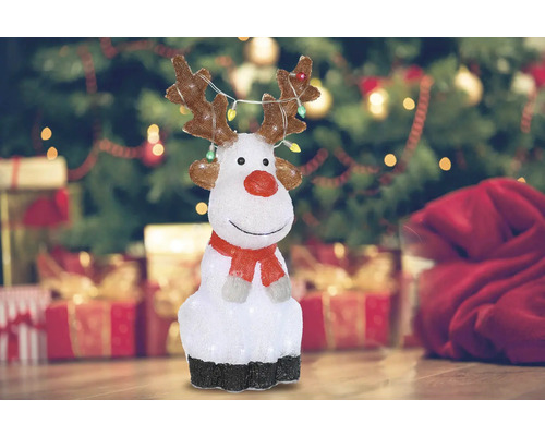 Renne décoratif avec éclairage pour la période de Noël.
