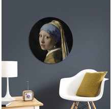 Décoration murale ronde représentant le tableau ''La Jeune Fille à la perle''.