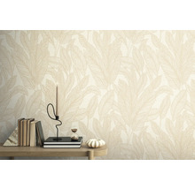 Gros plan d'un mur avec du papier peint à motif de feuilles