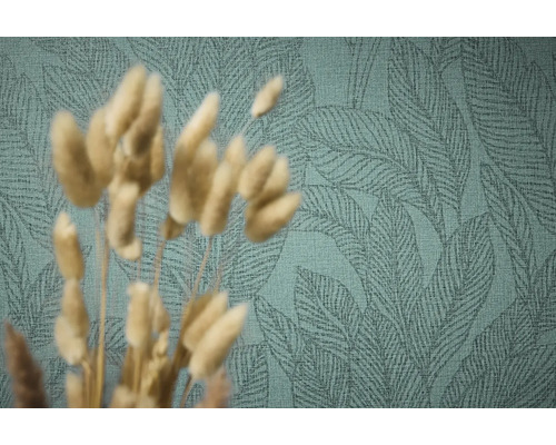 Gros plan d'un papier peint vert avec un motif de feuilles