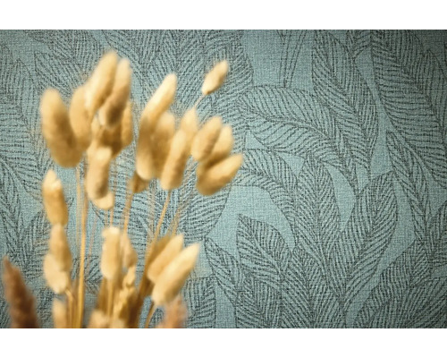 Gros plan d'un papier peint à motifs avec un dessin de feuilles