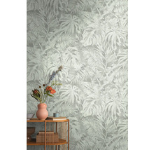 Papier peint avec motif de plantes tropicales sur le mur