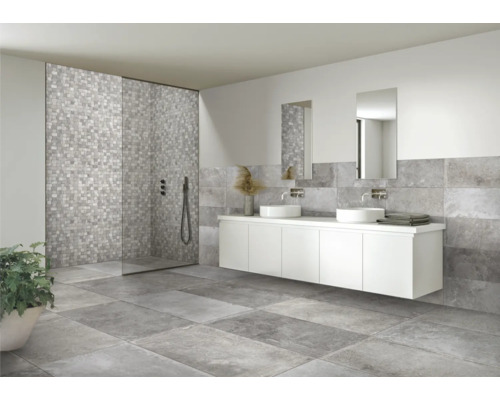 Salle de bains moderne avec carrelage gris, cabine de douche et meuble sous-lavabo