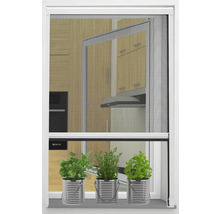 Stores anti-insectes Senn-Air devant une fenêtre avec des herbes aromatiques.