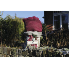 Plante emballée avec un sac de jute et une pancarte indiquant Bienvenue dans le jardin
