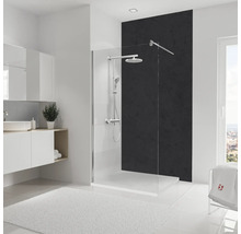 Salle de bain moderne avec paroi de douche, lavabo et serviettes